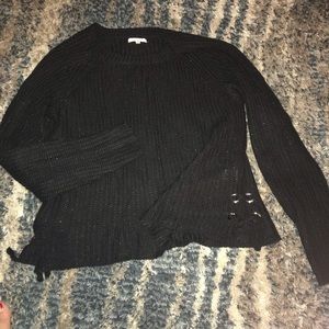 Maurice’s black sweater